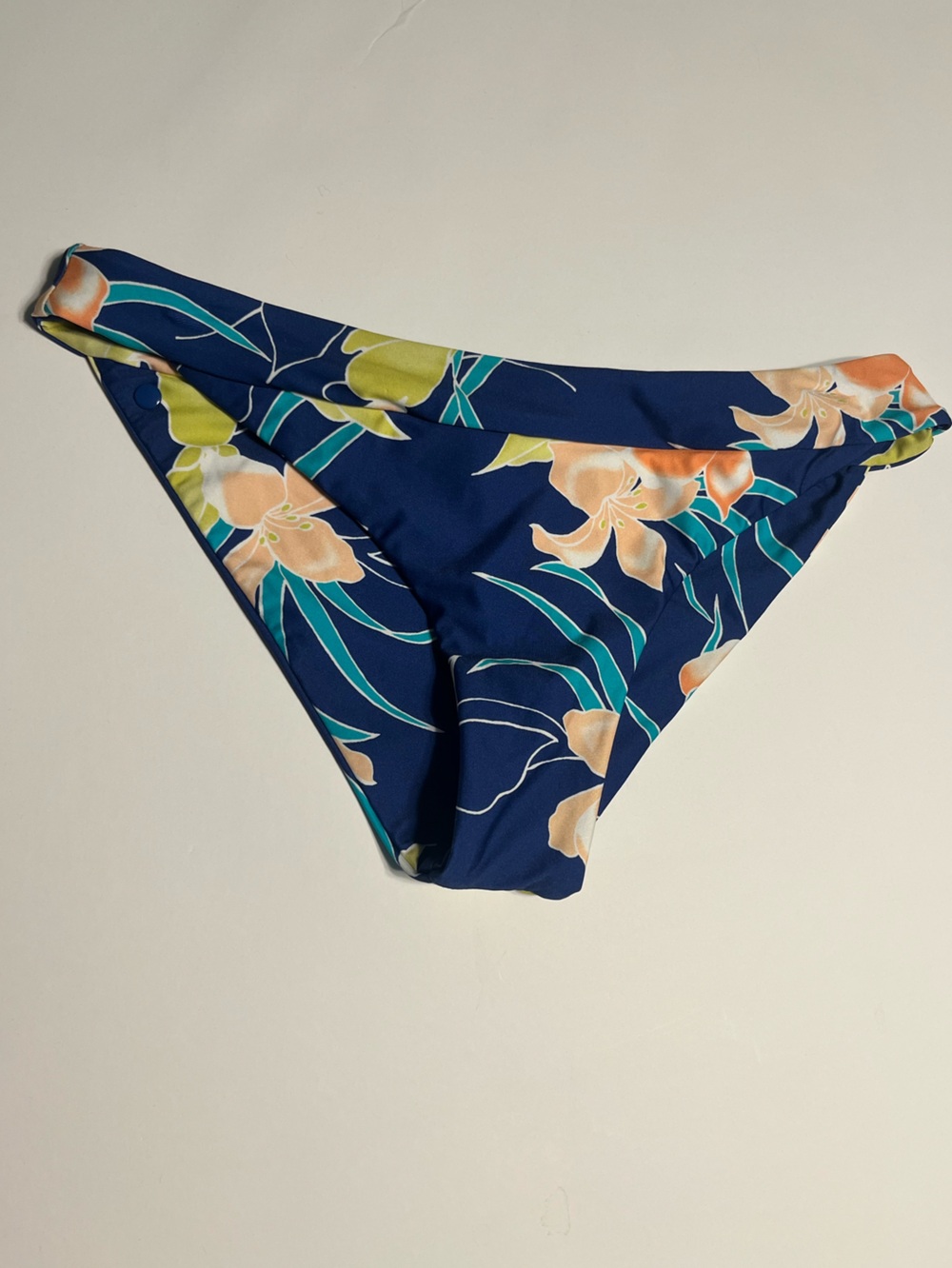 Volcom $60 NWT Navy Floral Swim Bottoms with Peach and Teal Accents. Small